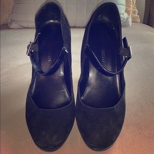 Suede black Mary Janes.